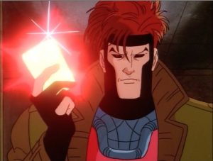 Gambit from X-Men holds a glowing card