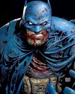 Head shot of Batman with an angry, bloody face.