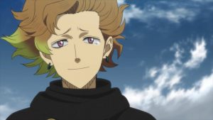face shot of Finral looking sad with blue sky and clouds in background.