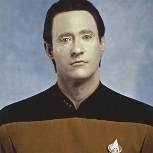 Data stares blankly in a head shot