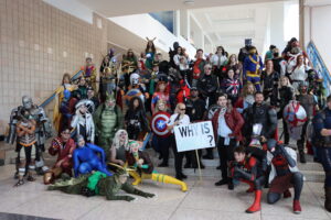 more than 50 Marvel cosplayers pose for a group photo