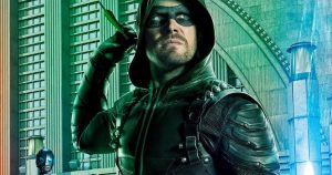 Green Arrow pulls an arrow from his quiver while looking forward at a target