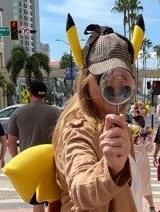 A cosplayer portray Detective Pikachu