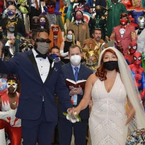 a young couple gets married at Megacon Orlando 2021
